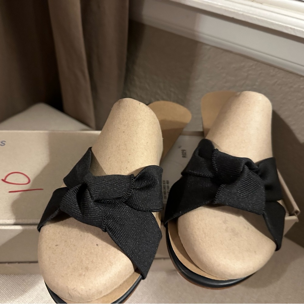 Brand new Rothy’s black sandals - women’s size 10.5. Still in box!